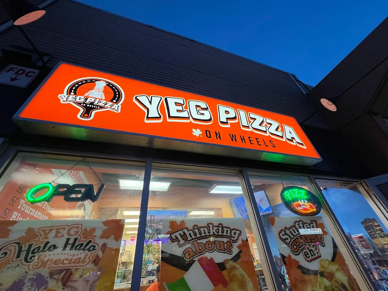 Experience handcrafted specialty pizzas at Yeg Pizza On Wheels in Edmonton